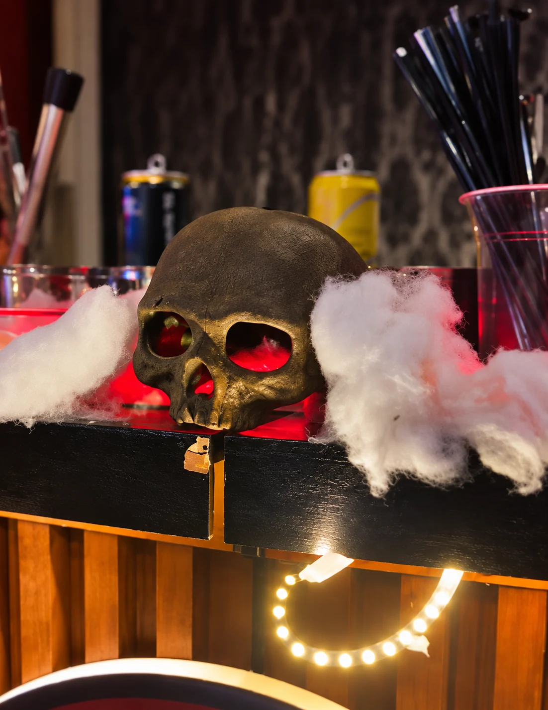 A themed mobile bar presentation with a decorative skull centrepiece.